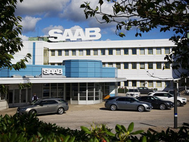 Some buildings that say Saab on them, yesterday